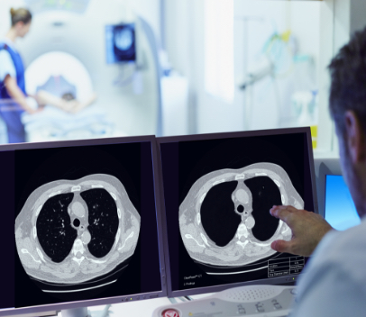Radiologist studies ClearRead CT images on computer