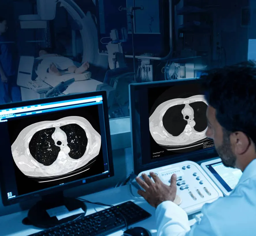 Radiologist studies ClearRead CT images on computer