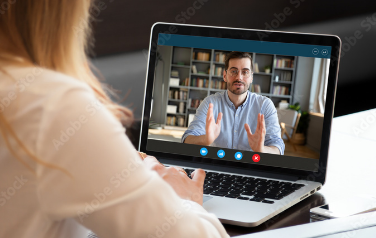 Riverain Technologies video widget featuring virtual ClearRead CT product demonstration on laptop screen for remote radiology education and product training.